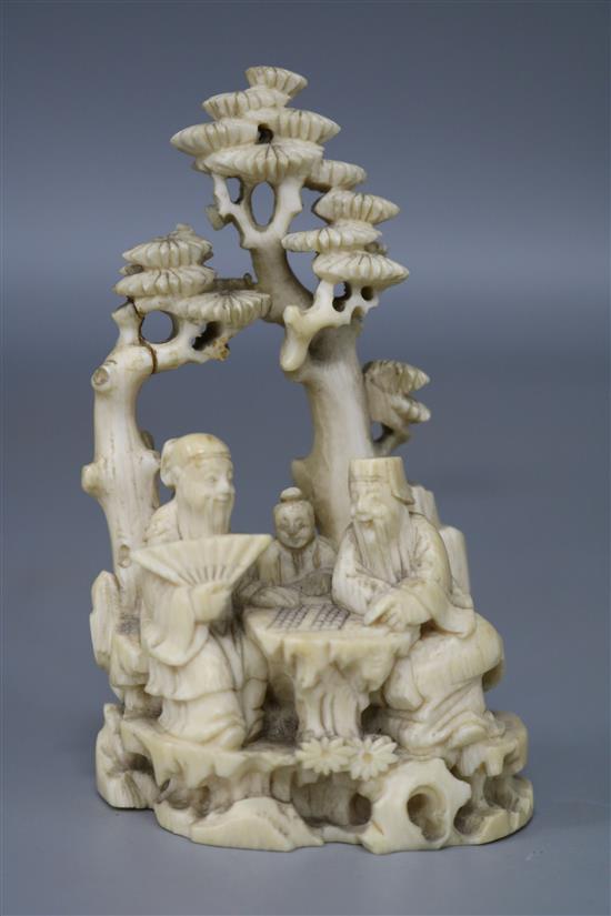 A 19th century Chinese ivory group playing chess